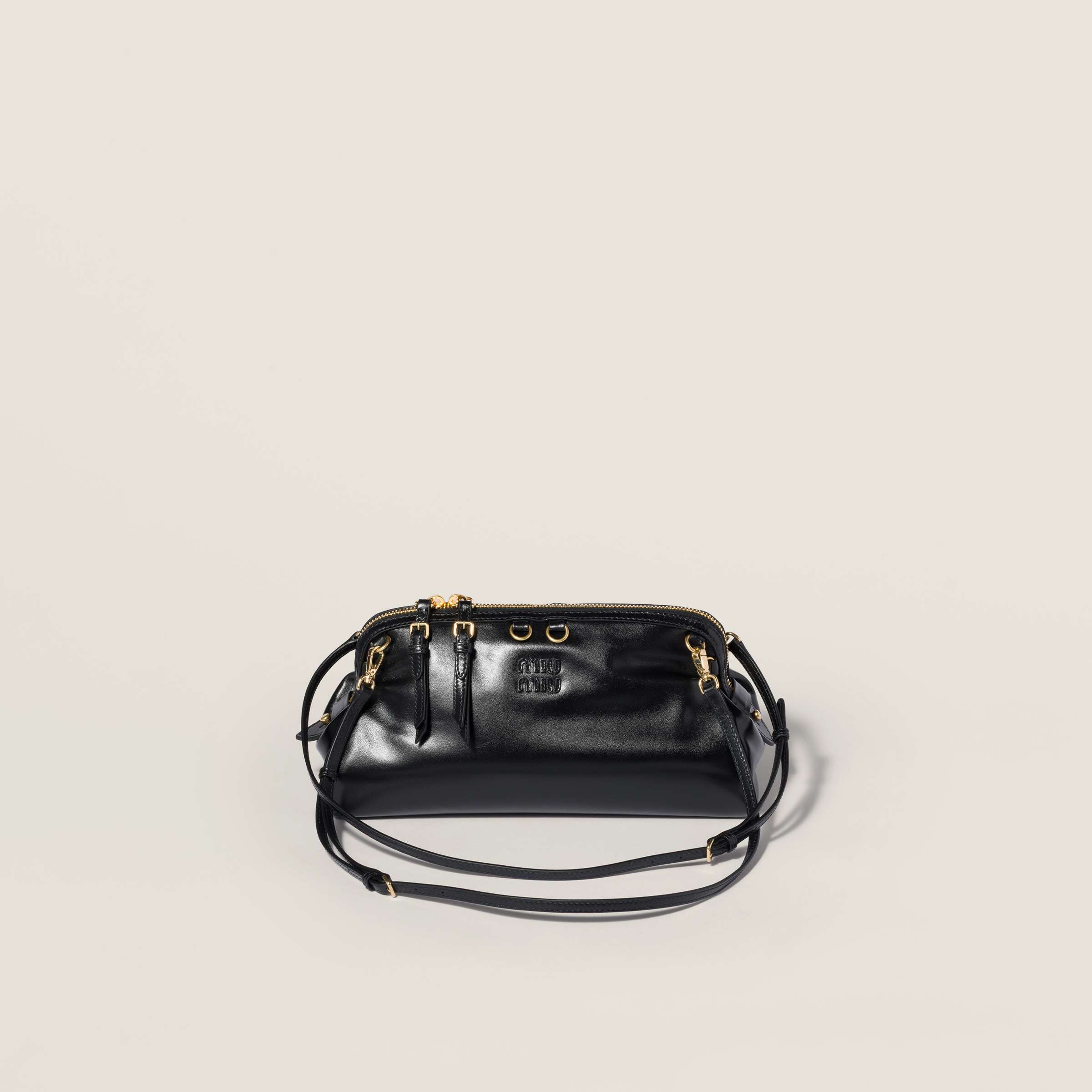 Caprice shiny leather clutch