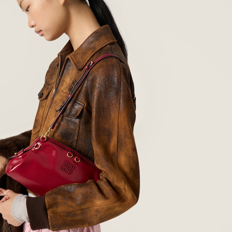 Caprice leather clutch