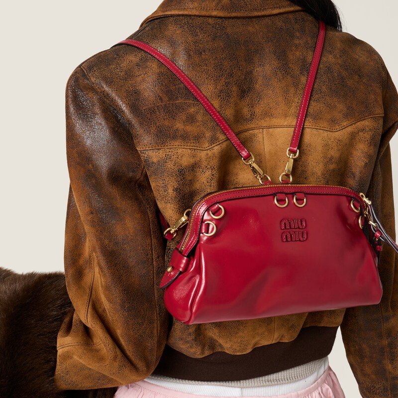 Caprice leather clutch