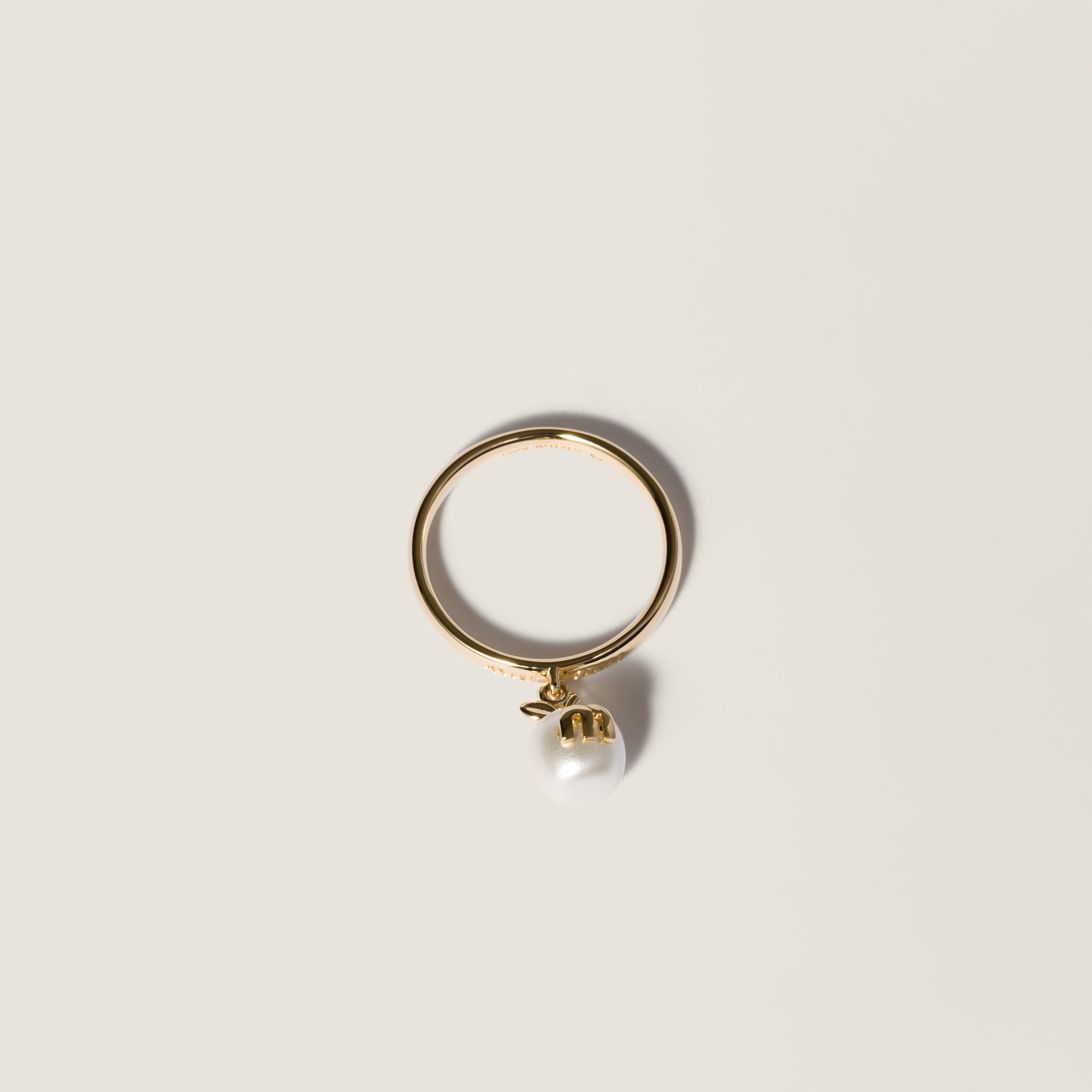 Metal ring with pendant