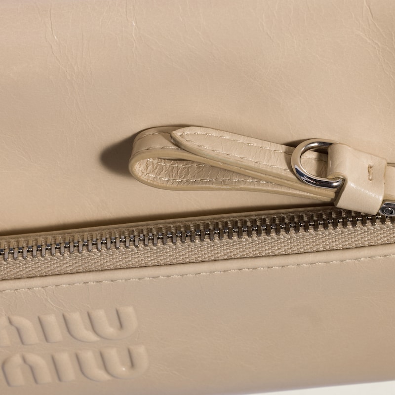 Leather pouch with shoulder strap
