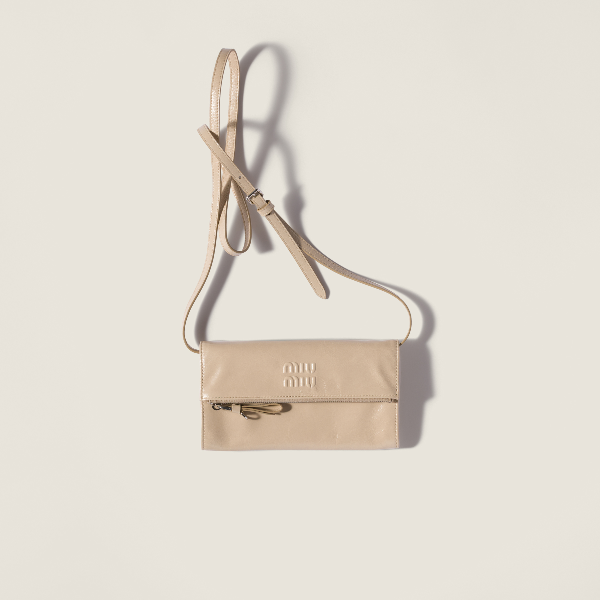 Leather pouch with shoulder strap