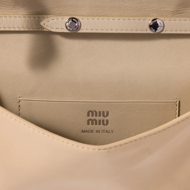 Leather pouch with shoulder strap