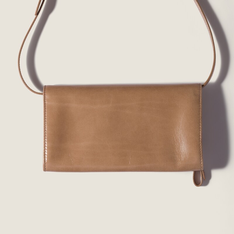 Leather pouch with shoulder strap