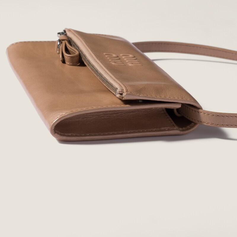 Leather pouch with shoulder strap