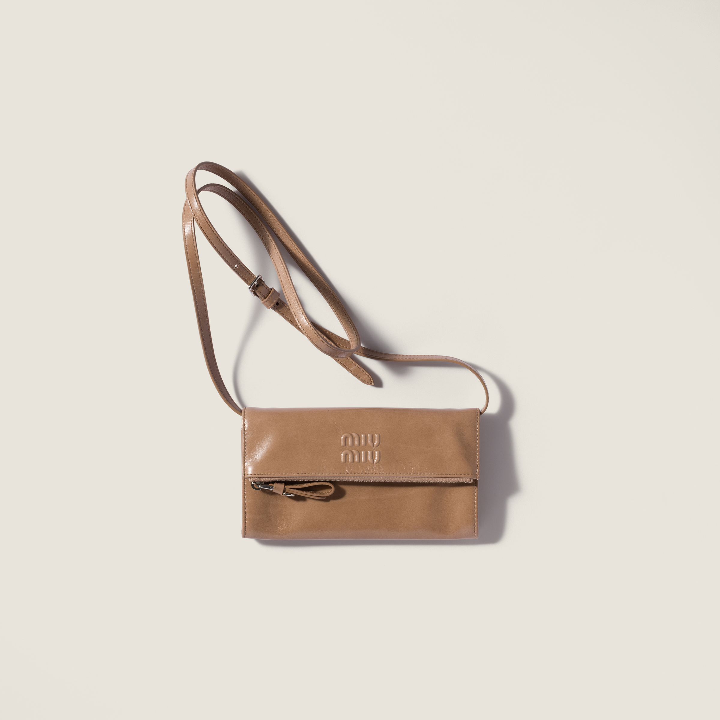 Leather pouch with shoulder strap