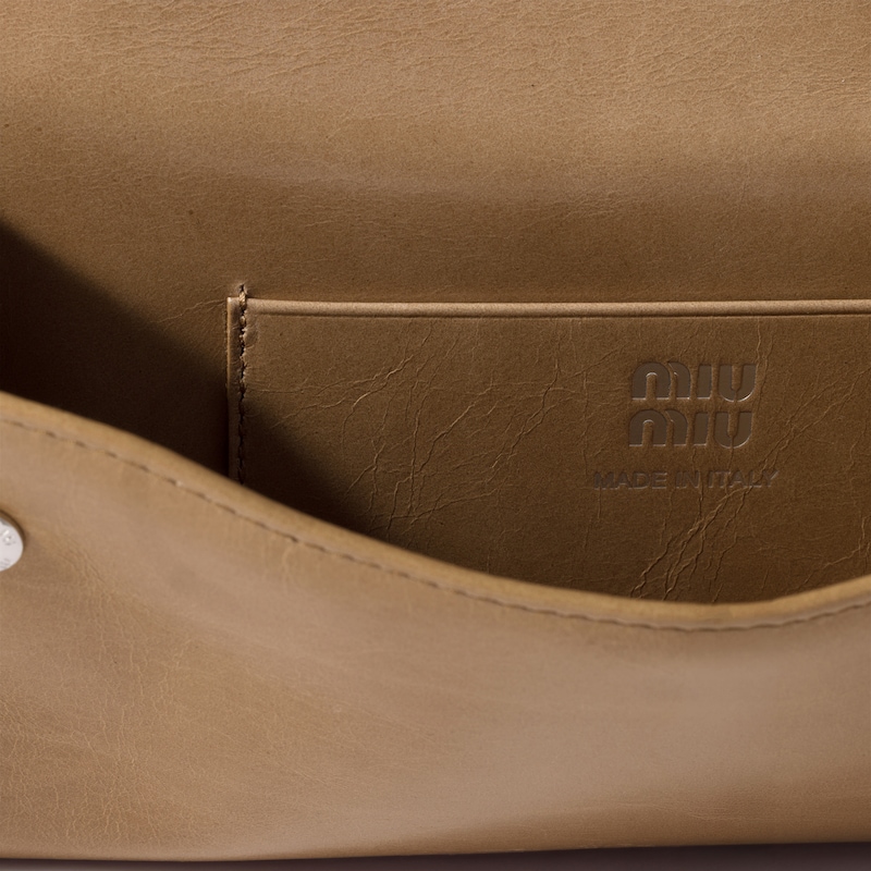 Leather pouch with shoulder strap