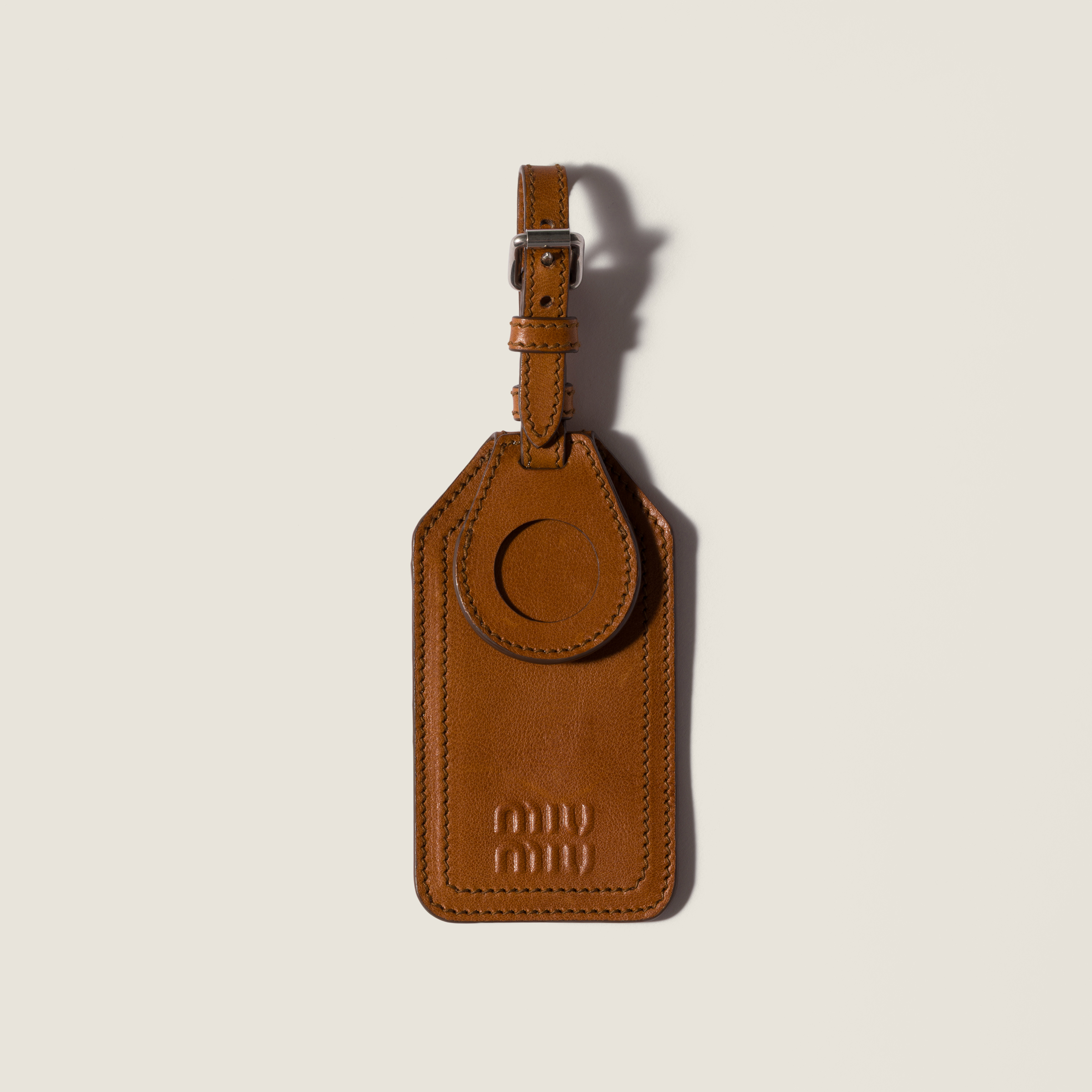 Leather name tag trick